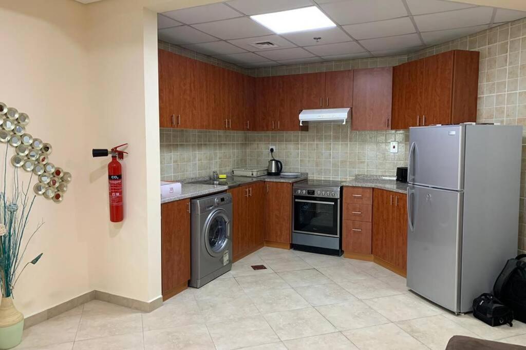 شقة Cozy 2Bhk Near To Dmcc Metro Station -505 دبي المظهر الخارجي الصورة