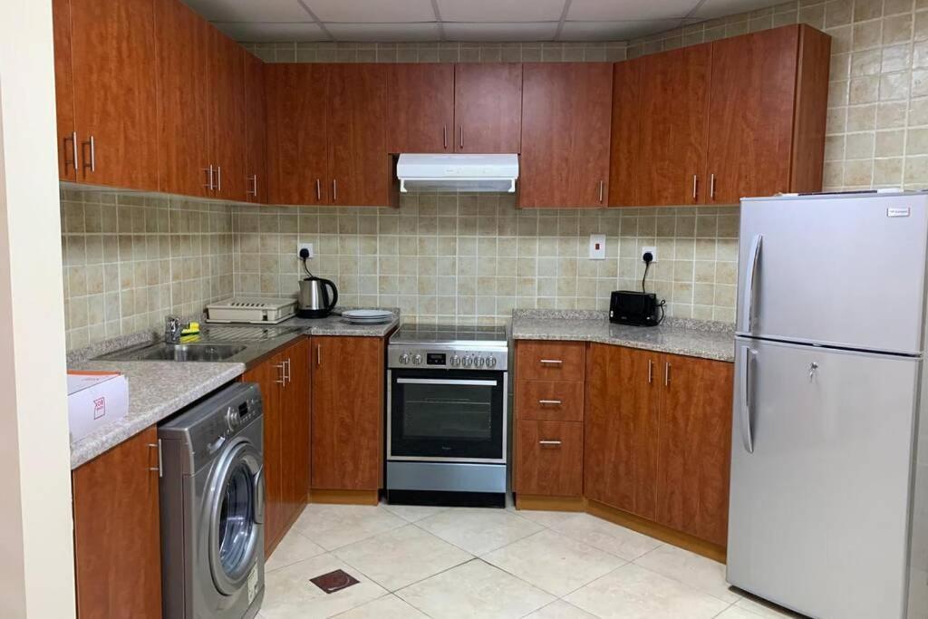 شقة Cozy 2Bhk Near To Dmcc Metro Station -505 دبي المظهر الخارجي الصورة